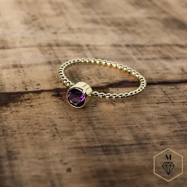 Gouden handgemaakte ring met amethist bij Mantje-Jewelry jouw nummer 1 juwelen webwinkel!